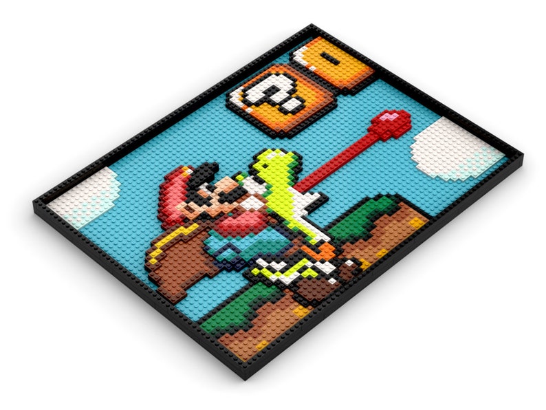 May include: A Lego mosaic art piece depicting a pixelated version of the classic Super Mario Bros. video game. The scene features Mario jumping over a green Koopa Troopa, with a question mark block above. The mosaic is framed in black.