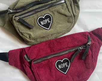 Kynd Bags "Nope Heart" heuptas rolschaats skate heuptas crossbody heuptas
