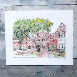 May include: Watercolor painting of the University of Richmond School of Law. The artwork depicts a red brick building with arched windows and a winding pathway. Lush green trees frame the building, and the text "University of Richmond School of Law" is visible.
