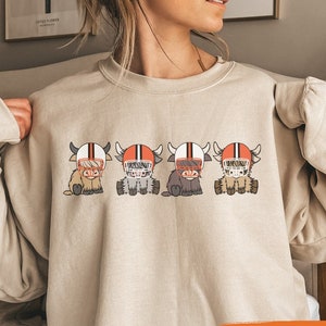 Cleveland Highland Cow Football Crewneck | Cleveland Football Sweatshirt | Cute Cow Crewneck | Cleveland Sweatshirt |