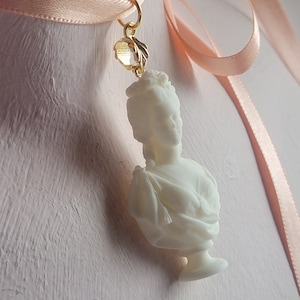 Marie Antoinette charm on random ribbon