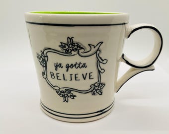 Anthropologie, Katie Mandy Mug "ya gotta BELIEVE" Coffee Mug