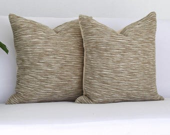 Neutrale boho-kussenset, lichtbruine kussenhoezen, minimalistisch beige decor, eenvoudig textieldecor, aardetinten bank decoratief accent