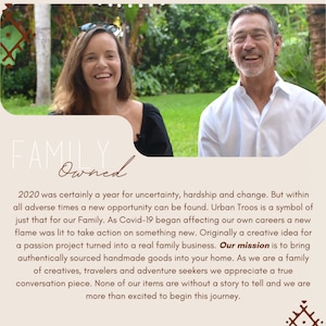 May include: A photograph of a man and a woman smiling outdoors, with text overlay reading "FAMILY Owned". The text describes the business's origins and mission to offer handmade goods.