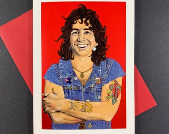 May include: A greeting card featuring a colorful illustration of a person with long brown hair wearing a denim jacket with patches and a tattoo on their arm. The background is red.