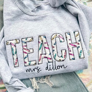 Embroidered TEACH Crewneck personalized with Name