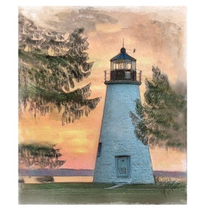 May include: A white lighthouse with a black roof and a black lantern room stands against a sunset sky. The lighthouse is surrounded by trees and a body of water.