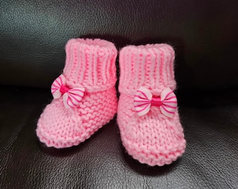 Handmade Knitted Pink Baby Booties with adorable bows for newborn girl