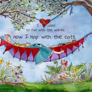 May include: Watercolor illustration of a person napping in a hammock with cats. The hammock is strung between two trees, with the text "I used to run with the wolves, now I nap with the cats." The image has a whimsical, storybook feel.