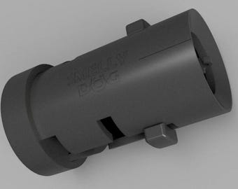May include: A black plastic adapter with the text "SMELLY DOG" embossed on the side.