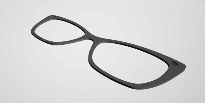 Pu&ograve; includere: Montatura per occhiali in plastica nera con forma ovale arrotondata.