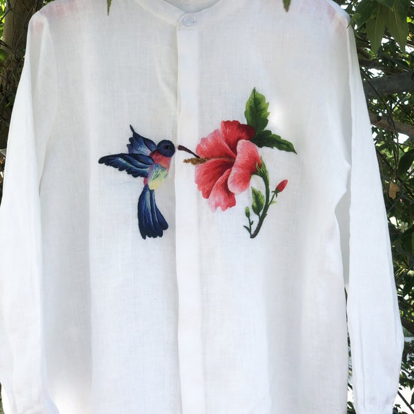 Hand embroidered  white linen shirt with hummingbird sipping the juices from hibiscus flower motifs, tinythingsmadeuhappy