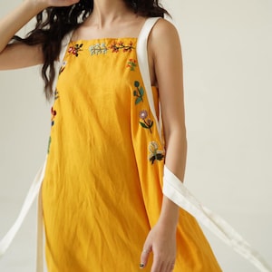 Yellow linen dress with hand embroidered flower, tinythingsmadeuhappy