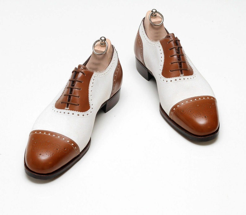 1940s Men’s Shoes: Men’s Vintage Shoe History     Mens Bespoke Handmade Two Tone Tan Leather And White Suede Oxford Brogue Shoes $169.99 AT vintagedancer.com