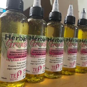 Herbal Hair Growth Oil /Chebe infused  Hair Oil enriched with Fenugreek ,black seed,Aloe Vera and Peppermint oils plus herbs