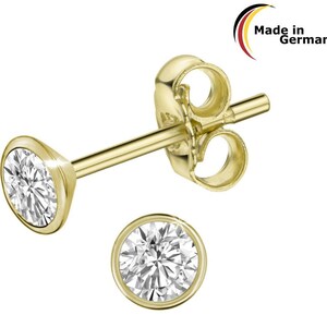 May include: Gold-coloured stud earrings with a round, clear gemstone set in a bezel. The earrings are displayed on a white background. The text "Made in Germany" is visible in the upper right corner.