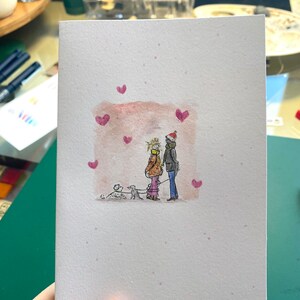 Bonita tarjeta de cumpleaños o San Valentín única en acuarela, pareja con 2 perros