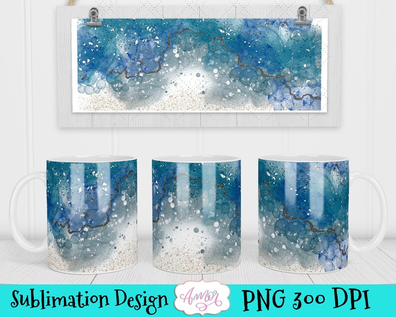 May include: Three white ceramic mugs with a sublimation design of blue and silver abstract watercolor. The design features a swirling pattern of blue and silver with a hint of glitter.