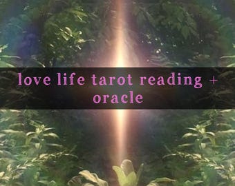 May include: Image features lush green foliage with a central beam of light and a rainbow effect. Text overlay reads "love life tarot reading + oracle". The image has a mystical and natural theme.