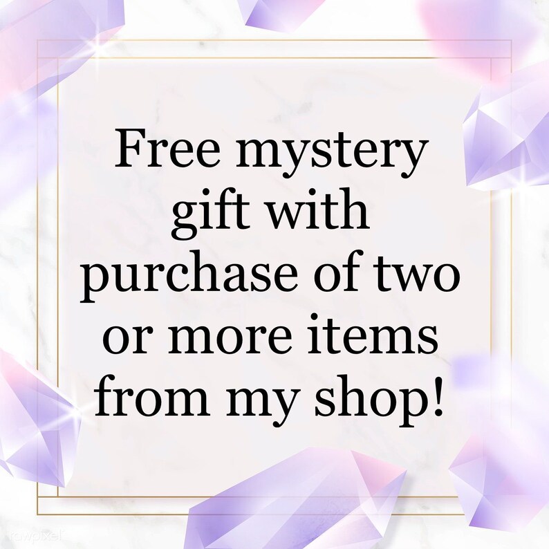 May include: A white background with a gold frame around a text box that says "Free mystery gift with purchase of two or more items from my shop!" The background is decorated with purple and pink crystal shapes.