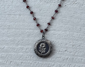 Gunmetal garnet locket necklace