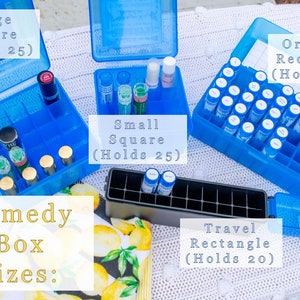 May include: A set of blue plastic remedy boxes in various sizes. The boxes are labeled with the size and capacity, such as "Large Square (Holds 25)", "Small Square (Holds 25)", "Original Rectangle (Holds 50)", and "Travel Rectangle (Holds 20)".