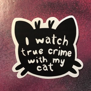 I watch true crime with my cat glossy laminated sticker