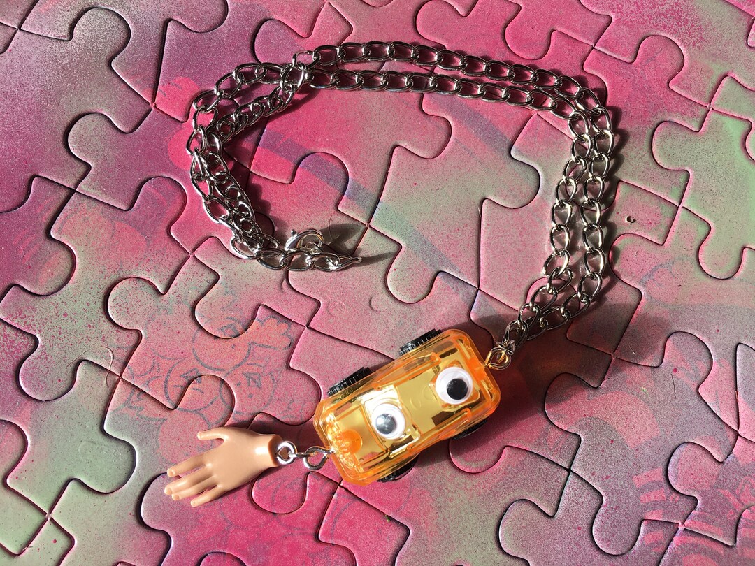 Toybox Trash Googly Eye Car and Barbie Hand Necklace Etsy