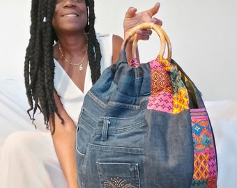 Tote bag made from recycled jeans, pink colored wax, wooden handles (rattan)