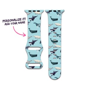 May include: Two light blue watch straps featuring a pattern of whales, including orcas and humpbacks. The straps have a white background and the text "PERSONALIZE IT! ADD YOUR NAME" is on the left strap.
