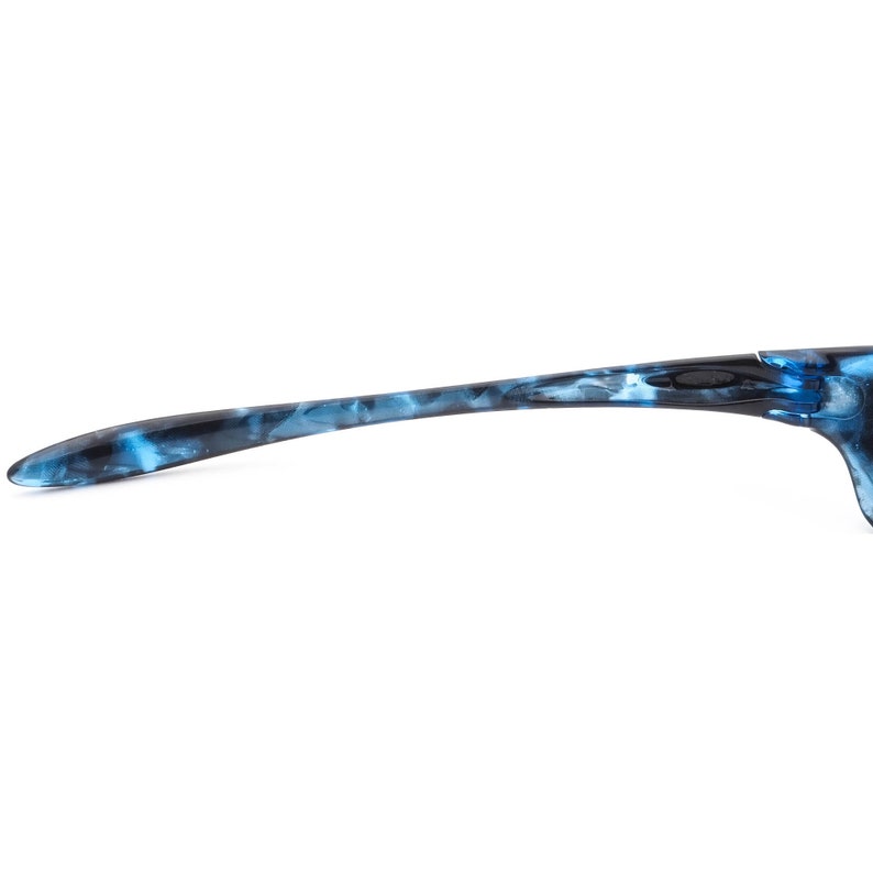 May include: A pair of blue and black sunglasses with a marbled pattern on the arms.