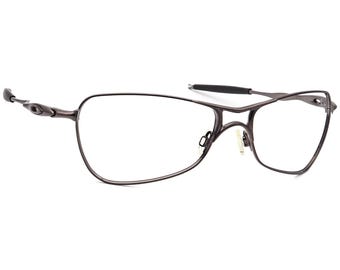 Gafas de sol Oakley con montura cruzada, metal en tono bronce, 61 mm