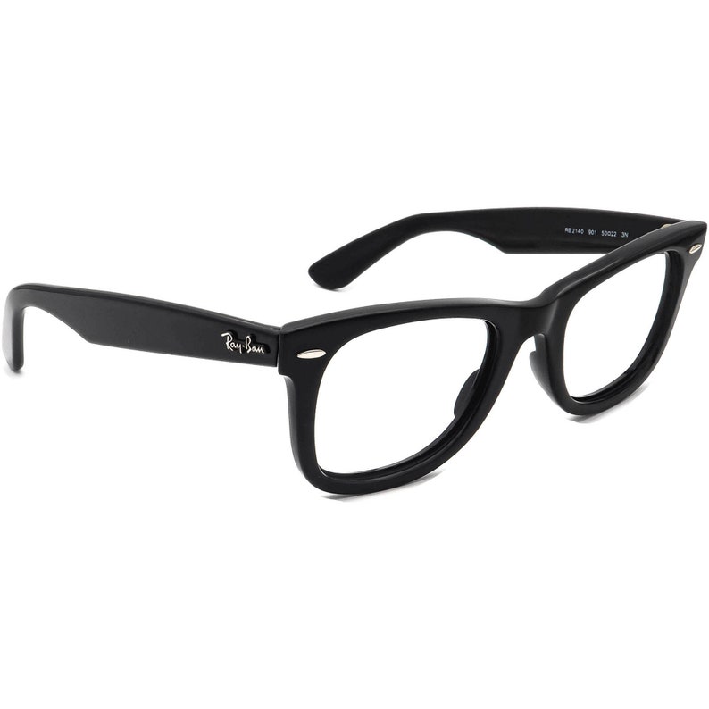 May include: Black plastic framed spectacles with clear lenses. The brand name "Ray-Ban" is printed on the left arm.