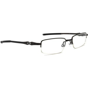 May include: Black metal frame eyeglasses with clear lenses. The frame has a thin, rectangular shape with a subtle curve at the temples.