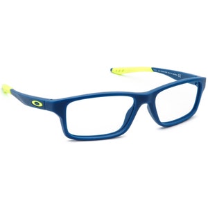 May include: Blue and neon yellow rectangular eyeglasses with clear lenses. The brand name is visible on the side of the frame.