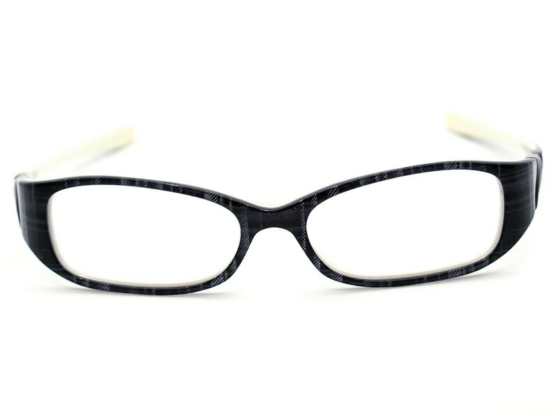 May include: Black and white patterned eyeglasses with a white frame.