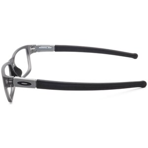 May include: Grey eyeglasses with black arms and the text "MARSHAL MNP" on the right arm.