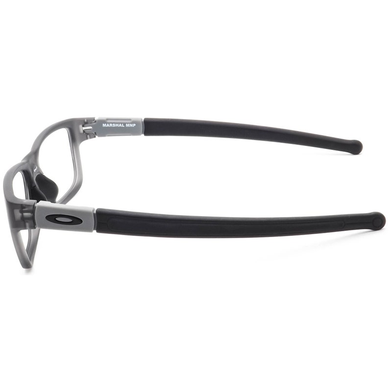 May include: Grey eyeglasses with black arms and the text "MARSHAL MNP" on the right arm.
