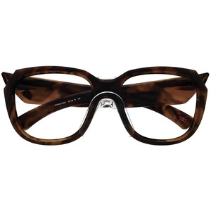 May include: Tortoise shell eyeglasses with a clear plastic nose bridge and a black inscription on the side that reads "00H42 0056 50 16 128". The inscription "USA assembled" is visible on the right temple.