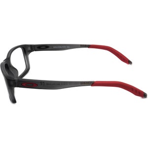 May include: Black and red eyeglasses with the text "CROSSLINK X3" on the side.