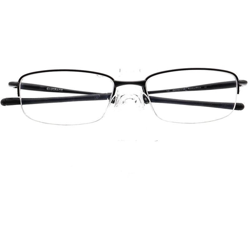 May include: Black metal frame eyeglasses with clear lenses. The frame has the text "CLUBFACE" printed on the left arm.
