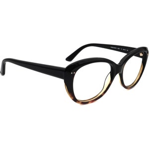 May include: Black and tortoise shell cat eye glasses with clear lenses.