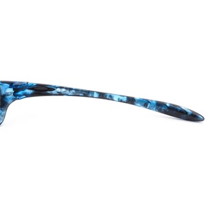 May include: Blue and black patterned sunglasses with a thin frame.