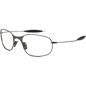 May include: A pair of rimless eyeglasses with a dark gray metal frame. The lenses are clear, and the temples have black rubberized tips for comfort. The design is sleek and modern, suitable for everyday wear.