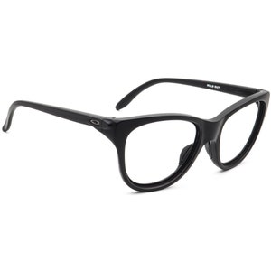 May include: Black cat-eye eyeglasses with clear lenses. The frames are thick and have a rounded shape. The text "HOLD OUT" is printed on the top of the frame. The Oakley logo is visible on the side of the frame.