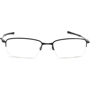 May include: Black half-rim spectacles with a thin metal frame.