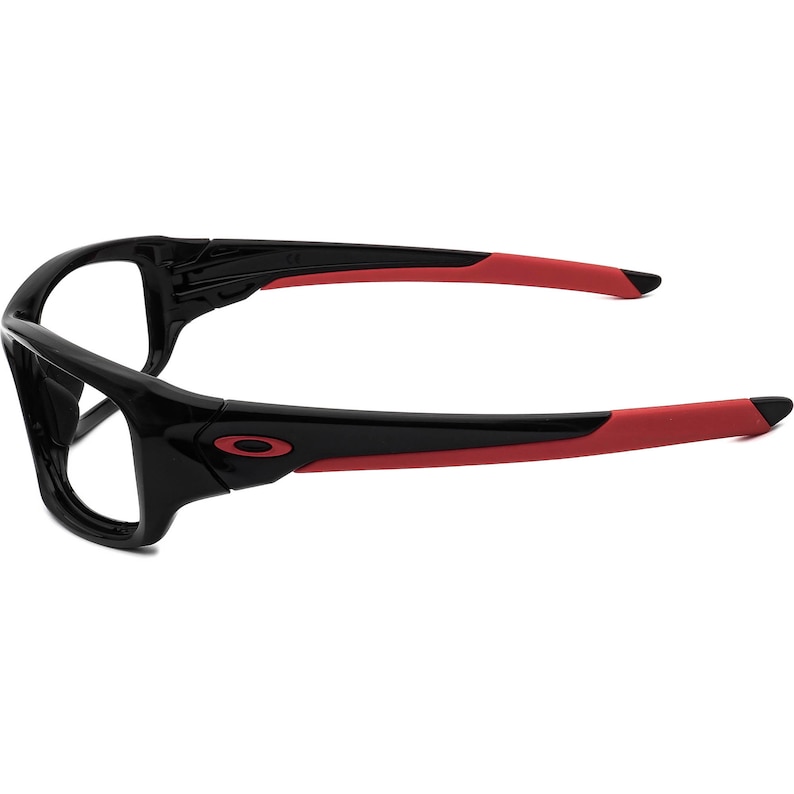 May include: Black and red frame sunglasses with a sporty design. The frame is made of a durable plastic material and has a red accent on the temples.