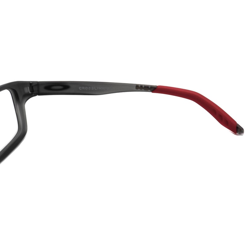 May include: A pair of black and red glasses with the word "CROSSLINK" printed on the frame.