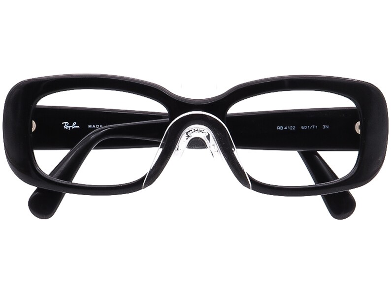 May include: Black plastic framed eyeglasses with clear lenses. The Ray-Ban logo and MADE IN ITALY are printed on the left arm. The right arm has the text RB 4122 601/71 3N.