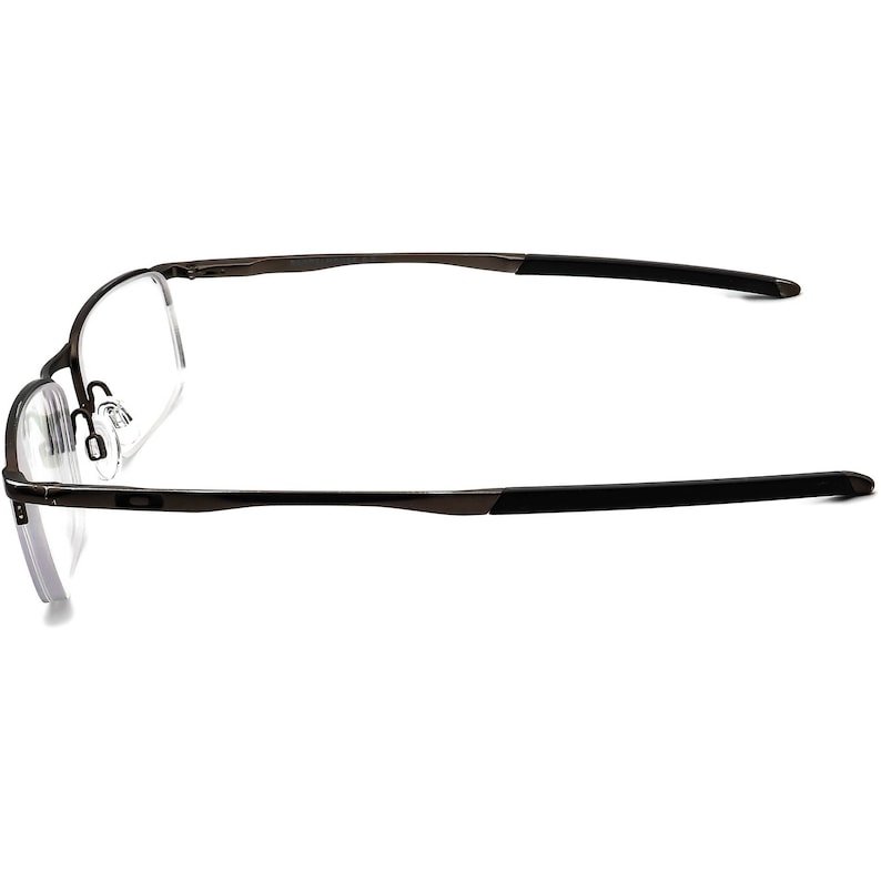 May include: A pair of black and silver eyeglasses with a thin metal frame.